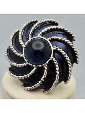 Avon Brooch Navy Blue Enamel Pinwheel Silver Tone Vintage Moonwind Piece